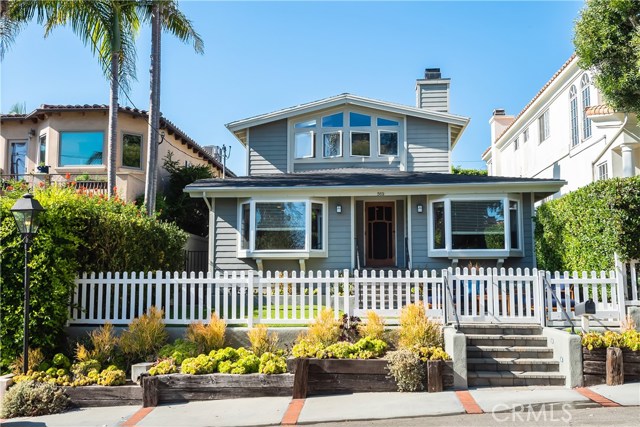 569 31st Street Manhattan Beach, California This completely remodeled charming Cape Cod home in the Gaslamp tree section location is a must-see. Upon entering, you will experience the open floor plan, where the kitchen, dining area, and living room flow together with beautiful vaulted wood & beamed ceilings, large bay windows that allow for lots of natural light, & fireplace making you feel warm & cozy at home. On that same level, there is a library/den with built-in bookshelves, a computer desk, & speakers, two lovely bedrooms with wainscotting, a gorgeous remodeled full bath, & a powder room. The gourmet chef’s kitchen offers a large granite center island, breakfast bar, custom cherry hardwood cabinets, stainless steel appliances consisting of a 5-burner cooktop, beverage fridge, 48” Subzero fridge & freezer, two Thermador ovens, built-in microwave, & 3 dishwashers. Upstairs, there is the huge romantic master suite that has A/C & a gorgeous master bathroom with dual showerheads, a steam shower, a large separate soaking tub, & skylights. The private backyard is an entertainer’s paradise with a built-in BBQ, a large fireplace with Brazilian slate hearth, & is perfect for al fresco dining. There is also a large detached private guest quarters above the oversized 2-car garage with a kitchenette, full bath, A/C, & balcony. Additional amenities include hardwood floors, ceiling fans, built-in dressers, built-in desks, & vaulted beamed ceilings throughout.