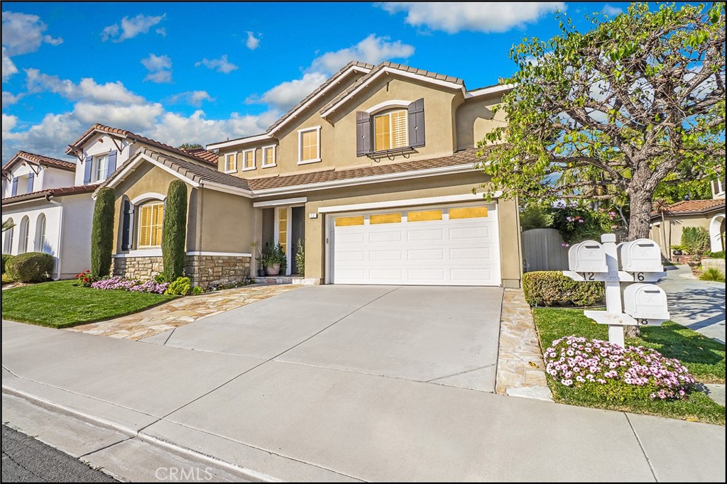 AWESOME CUL-DE-SAC LOCATION WITH VIEW OF GENTLE SLOPES AND GREENBELTS, ADDED PRIVACY, AWESOME FLOOR PLAN AND UPGRADES THROUGHOUT! 10+ curb appeal with stone accented walkway leading to the front entry and foyer unveiling a huge living room/great room with designer fireplace and custom bi-fold doors leading to the inviting backyard with privacy. Large formal dining room and a spectacular kitchen with large center island, designer cabinets and countertops, stainless steel appliances including double wall ovens, gas range, pendant lights over the island and breakfast nook with sliding door. Main floor also features a main floor bedroom, bathroom with walk-in shower and upgraded vanity, plus an office. Upgraded wood flooring, custom crown molding, designer lighting fixtures, added ceiling fans and solar tubes in master suite walk-in closet and in upstairs secondary bathroom to bring in plenty of natural light, custom plantation shutters and electric car charger. Designer accented staircase leading to the send story which offers 4 additional bedroom including the exercise room with treehouse loft, full size laundry room with plenty of cabinets and deep sink, and a large bonus room which is the perfect area to enjoy the movie night /game day with the family or friends. Double doors leading to the spacious master suite with French Doors and Juliette balcony overlooking the amazing yard and views of lush slopes and a large master bathroom with separate tub and large walk-in shower, large vanity with dual sinks and a large walk-in closet with custom closet organizers. There is also a large full bathroom with large vanity, dual sinks and upgraded fixtures. The large bi-fold doors leading from the living areas to the amazing yard featuring a custom BBQ bar, outdoor fireplace area provide the perfect combination to enjoy the highly sought after indoor/outdoor living experience which is enhanced by the view of the greenbelts and no other homes directly behind and added privacy. All this plus, highly sought after schools, excellent proximity to Aliso Viejo Town center with shops, restaurants and theaters, easy toll road (73) and beach access via 133 and nearby hiking, biking and nature trails.