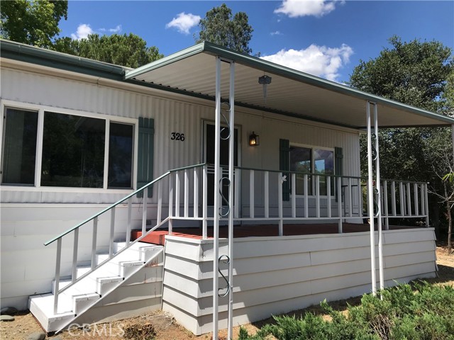 Enjoy your morning coffee on the covered front deck.