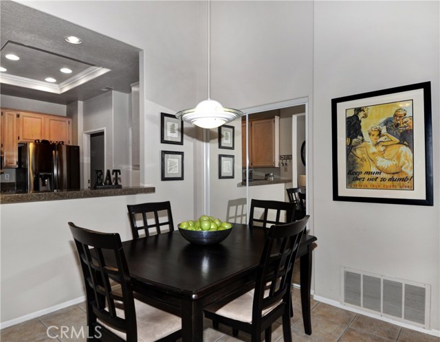 Dining area, opens to kitchen.