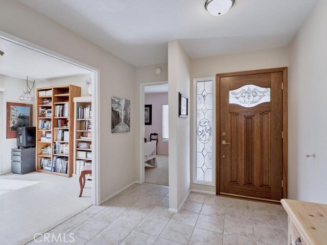 Entry way showing two secondary bedrooms, entry and hallway