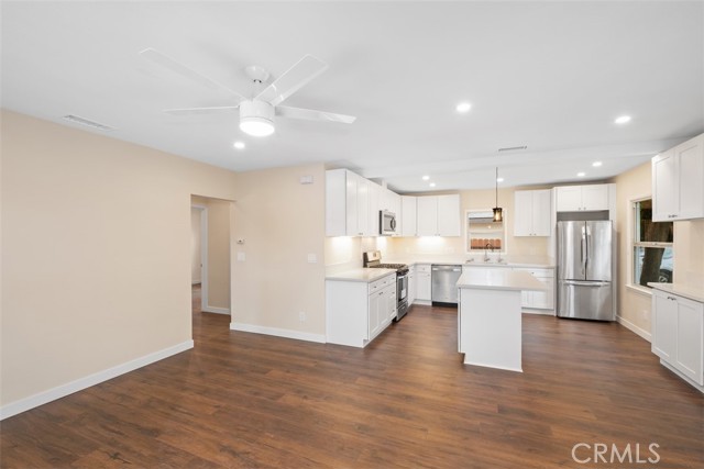 New lighting, new fans in each room. Gorgeous original floors professionally refinished.