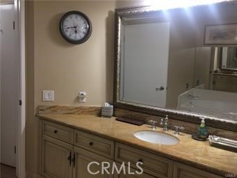 Granite Counters in Master Bathroom and Custom Cabinets