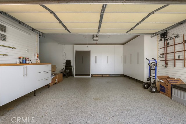 interior side area could be for exercise.  equipment, has ceiling fan. Must see