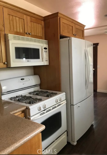 Kitchen opposite side with new appliances.