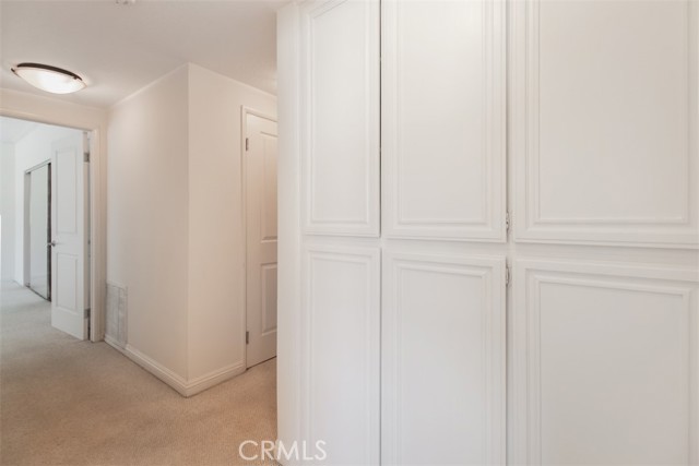 Hallway and Multiple Storage Cabinets