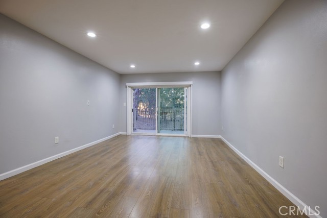 Living room with lots of natural light with the Wilderness Park view of nature