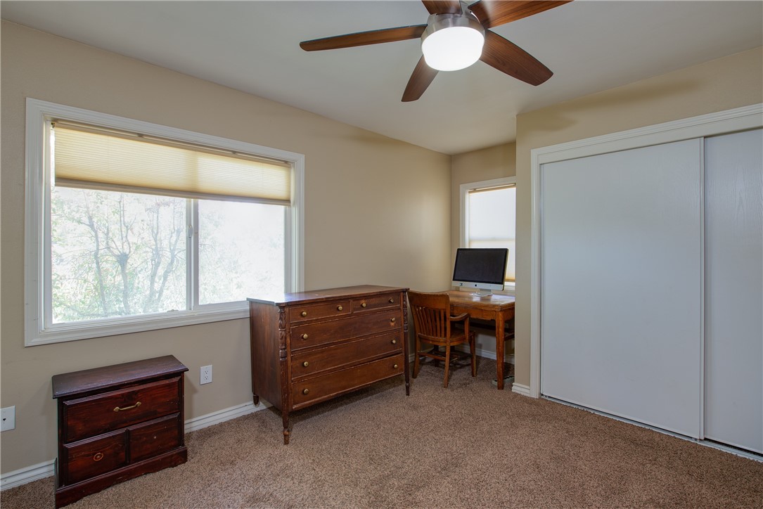 The primary bedroom is in the front of the home and has a ceiling fan to keep you cool on those warm days.