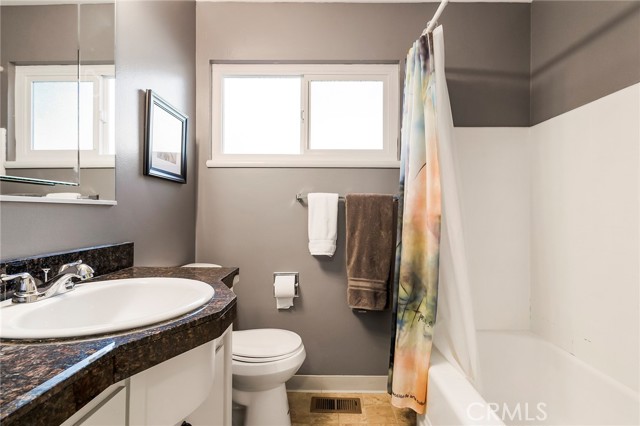 Tub shower in hall bath