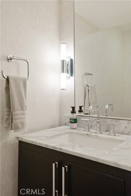 Powder room near kitchen