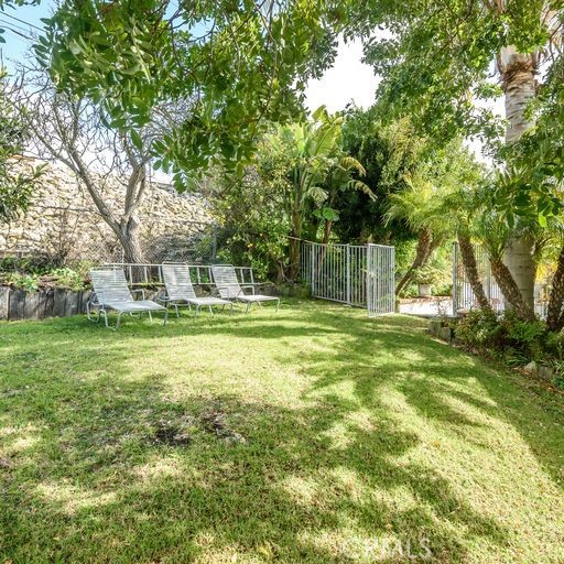 grass area near pool with ocean view