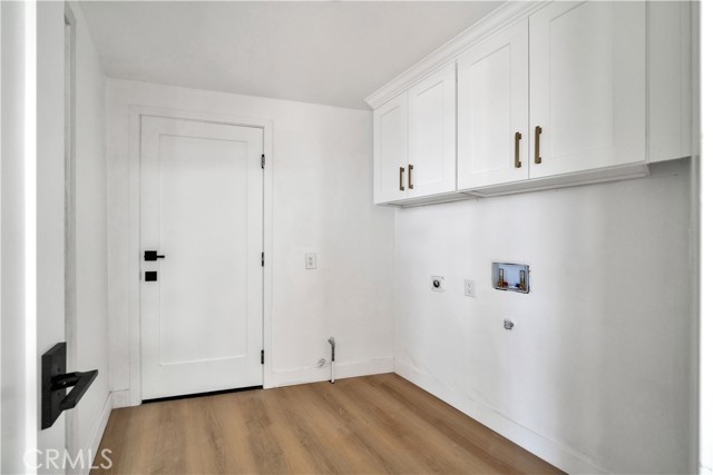 Laundry Room. Powder Room on left side