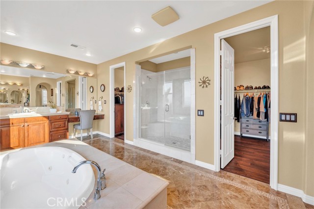 Primary bathroom with vanity and second sink