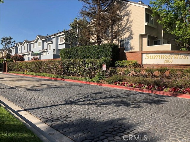 2800 Plaza Del Amo 198 Torrance, California Light and bright end unit in the very desirable gated community of "Summerwind". Quiet location and close to lots of guest parking. Newer hardwood floors in living room and newer carpet in the bedrooms. Kitchen with stainless appliances (stove and refrigerator included) with tile counters opening up to the dining area. All bedrooms are upstairs and good size with mirrored wardrobes. Laundry room (washer and dryer included) is in the bonus area downstairs off the 2 car attached garage with direct access. Forced air heat and AC. Beautifully landscaped and well maintained complex with 3 pools/spa/clubhouse and children's play area. Walk to the Farmer's market on Tuesday's and Saturday's. Close to schools, shopping, restaurants and Wilson Park. Award winning Torrance schools!!!