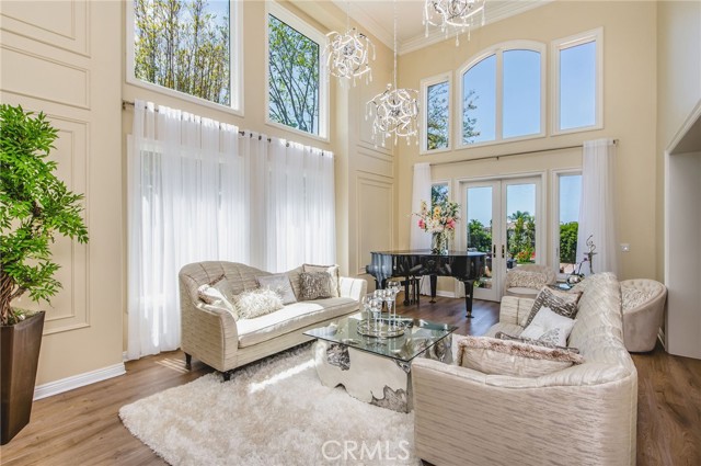 Natural light bathes the formal living room at all angles. Natural light bathes the formal living room at all angles.