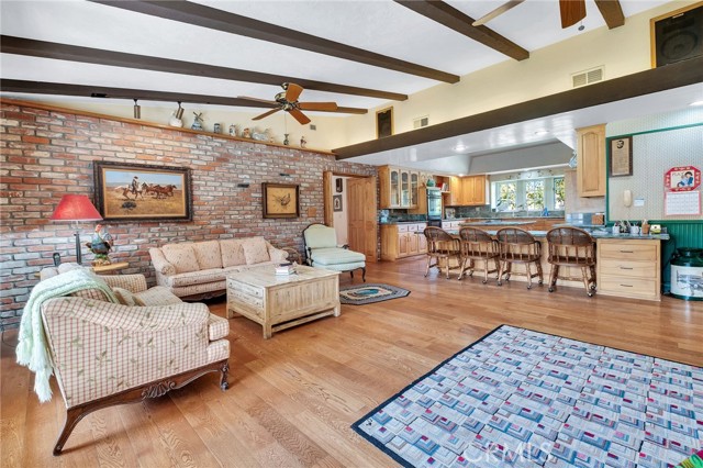 The kitchen looks into this family room