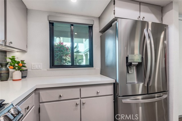 Double Pane kitchen window with custom Electric blackout blind.