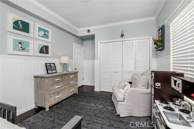 Third bedroom big enough for dressers, toys, chair to read a book and built-in closet.