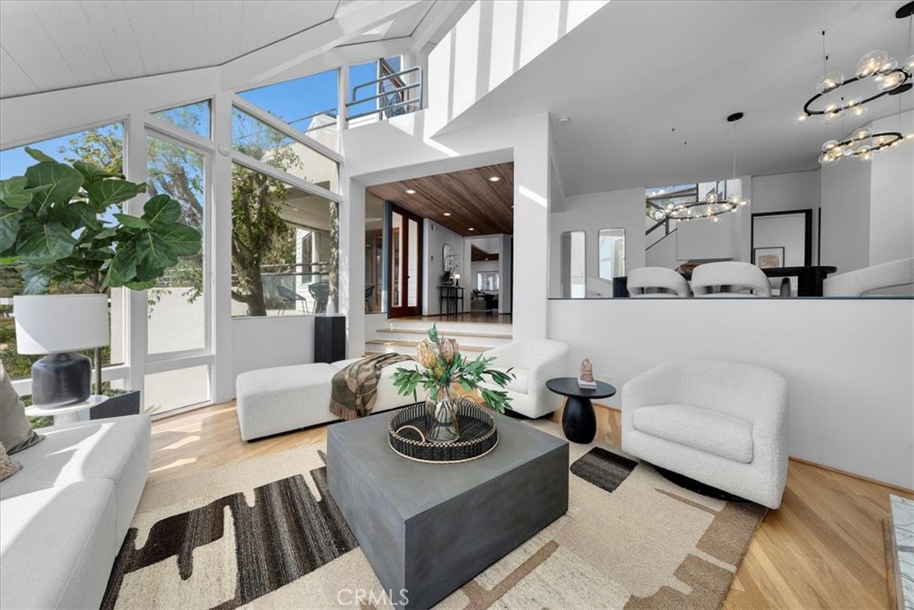 Rare Coastal Opportunity in Laguna Beach’s Coveted Portafina Neighborhood
741 Marlin Drive - Welcome to this hidden gem nestled in the highly sought-after Portafina community—a peaceful, ocean-view enclave perched above Victoria Beach. This 4-bedroom, 2.5-bath soft contemporary home is situated on a quiet, single-loaded cul-de-sac, offering a unique blend of privacy, architectural character, and untapped potential in one of Laguna’s most desirable neighborhoods.
As you step through the front courtyard, you'll be greeted by a sun-filled foyer featuring vaulted ceilings, oversized picture windows, and three inviting fireplaces that create a warm atmosphere throughout the home. The split-level layout includes a main-level guest bedroom with convenient courtyard access, an open-concept kitchen boasting sweeping ocean views, and a spacious deck—perfect for relaxing or entertaining while enjoying breathtaking sunsets. The primary suite is a true retreat, showcasing panoramic ocean vistas, an ensuite bath, a private balcony, and a soothing sense of tranquility. Additional highlights include a cozy family room, a sauna with a separate shower, and thoughtful updates that enhance the home’s charm and functionality .With solid bones, incredible views, and ample space to add an ADU, this property represents a rare opportunity to customize and add value—whether you’re a first-time homebuyer, an investor, or someone seeking to craft their ideal coastal retreat. Don’t miss your chance to own a piece of paradise in Laguna Beach!