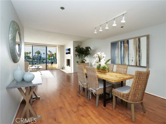 Dining and Living Area with Laminate Flooring
