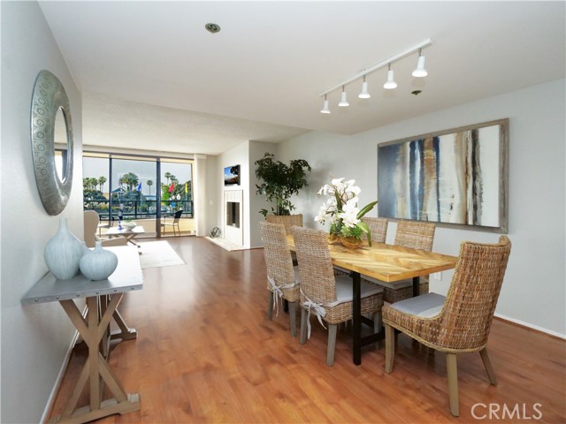 Dining and Living Area with Laminate Flooring