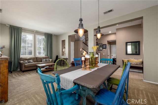 Dining room with pendant lighting.