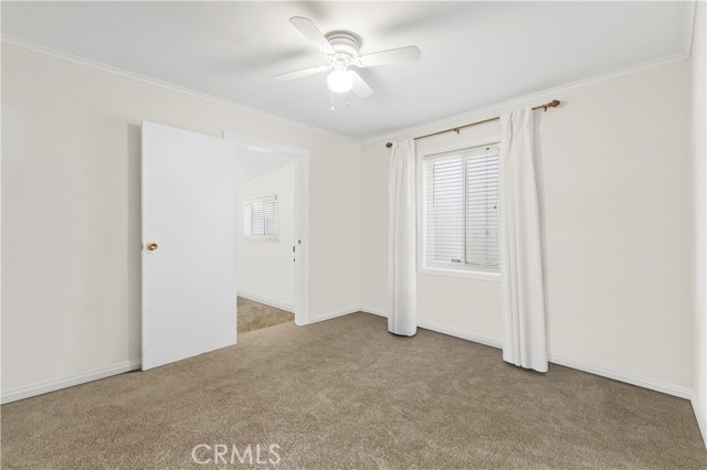 Primary bedroom leading to office/den