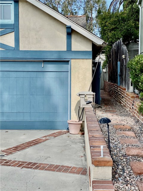 270 MOSS Street Laguna Beach, California Charming, private, quiet cottage with beautiful sunsets. This is a guest house on property with private entrance. Relax in a peaceful garden setting located in the beautiful Woods Cove area. This charming older cottage has laminated hardwood floors, cathedral beamed ceilings and big light and bright windows. Walk in closet! Large brick patio with yard and extra room perfect for office, studio or small bedroom. Tenants always stay many years. Make this older cottage your own special home. Washer/dryer, gas and water included. Parking is long driveway on the west side of house. Tenant to verify sq ft if a factor for renting.