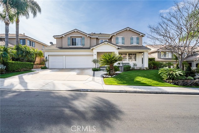 Welcome to 17742 Neff Ranch Rd, a meticulously maintained 6-bedroom, 4.5-bathroom home that offers the perfect blend of space, style, and convenience. Situated in a convenient and desirable side of town, this stunning residence boasts incredible curb appeal with an expansive driveway and an oversized 3-car garage. Step inside to be greeted by a spacious and inviting formal living and dining room, setting the tone for elegance and comfort. The recently remodeled kitchen is a chef’s dream, featuring soft-close cabinetry, an island and separate bar seating, coffee bar area, a walk-in pantry,  ample storage, a separate office nook and dining area—all seamlessly opening to the generously sized family room, perfect for gatherings. Designed for flexibility and function, this home includes a sought-after downstairs bedroom with an en suite full bathroom, ideal for guests or multigenerational living.
Upstairs, the primary suite is a true retreat, complete with custom built-ins, a spacious remodeled bathroom featuring two sinks, a soaking tub, and walk in shower, and a large walk-in closet. In addition to the oversized primary bedroom, there are four additional generously sized bedrooms, including an additional en suite bathroom and large walk-in closets. Additional highlights include newer vinyl flooring downstairs, dual-pane windows, plantation shutters throughout, multi-zoned AC, a central vacuum system, a convenient laundry chute, and the added convenience of an indoor laundry room.
Enjoy all the benefits of Yorba Linda’s rustic charm with modern amenities and no HOA or Mello-Roos! This prime location offers easy access to walking trails, community parks, shopping, freeways, and top-rated “A” schools. Don't miss your chance to own this remarkable home—schedule your showing today!