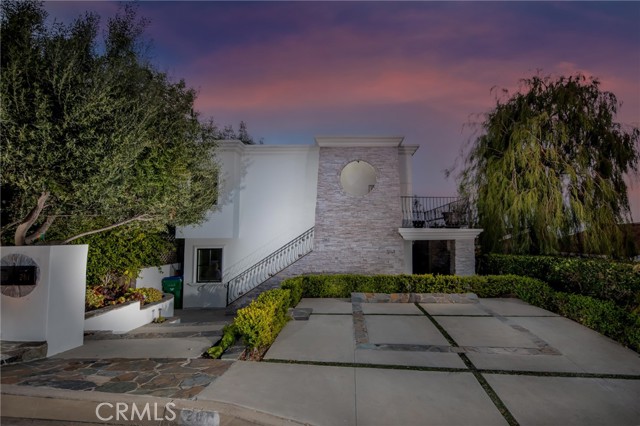 261 La Brea Street Laguna Beach, California This beautiful upgraded duplex has a beautiful Catalina view, fabulous ocean views, mountain views and city light views. The upper unit boasts 3 bedrooms, 2 1/2 bathrooms, with granite counter tops, quartz top kitchen counters, travertine and wood flooring throughout, ceiling fans in every room, a fireplace and air conditioning. There are two upstairs decks, one with a firepit. The lower unit has 3 bedrooms, 2 bathrooms with wood flooring throughout, granite countertops and two private patios. There is also a 400 square foot patio downstairs, great for entertaining with ocean views, along with a two car garage, with carport and two off-street parking spaces and both units have tankless water heaters. There is also a grassy area for your pets. There are two separate water meters and low maintenance landscaping. This would be a great opportunity for either a multi-family of generations to all be together , an owner occupied property unit, with income property below or just income property in North Laguna Beach.