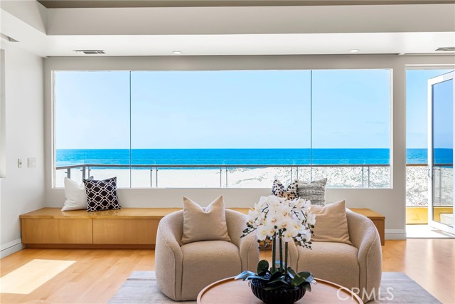 1554 E Oceanfront Newport Beach, California Experience the epitome of luxury beachfront living at 1554 E Oceanfront in Newport Beach, California. This stunning residence, located in the prestigious Balboa Peninsula Point offers a captivating blend of elegance and modern amenities. Boasting five spacious bedrooms and a five-car subterranean garage, this home promises ample space and convenience for both residents and guests. Step in to where the kitchen and living room seamlessly merge to create a harmonious space designed for comfort and elegance. The gourmet kitchen features top-of-the-line appliances, sleek countertops, and ample storage, making it a chef's delight and perfect for both intimate meals and grand entertaining. The adjoining living room is a sanctuary of relaxation, with its open-plan design providing a seamless flow from one area to the next. Expansive sliding glass doors open onto a stunning patio, blurring the lines between indoor and outdoor living and offering uninterrupted views of the majestic ocean. This exquisite setting is perfect for enjoying the tranquility of seaside breezes and breathtaking sunsets, creating a perfect backdrop for both everyday living and memorable Situated on 40 feet of Oceanfront frontage, the residence offers direct access to the beach, making it an ideal retreat for those w
