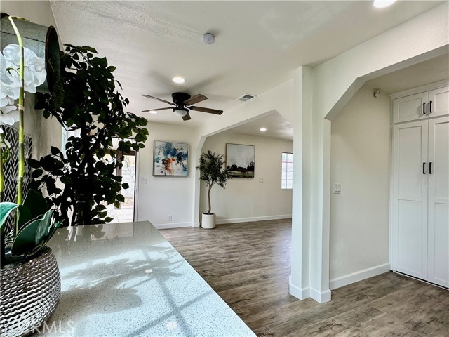 View of the front door from the kitchen sink