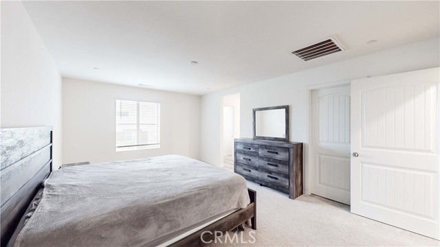 Primary with walk-in closet