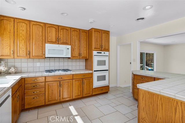 Wood cabinets were installed by current owner, date unknown. In good condition.