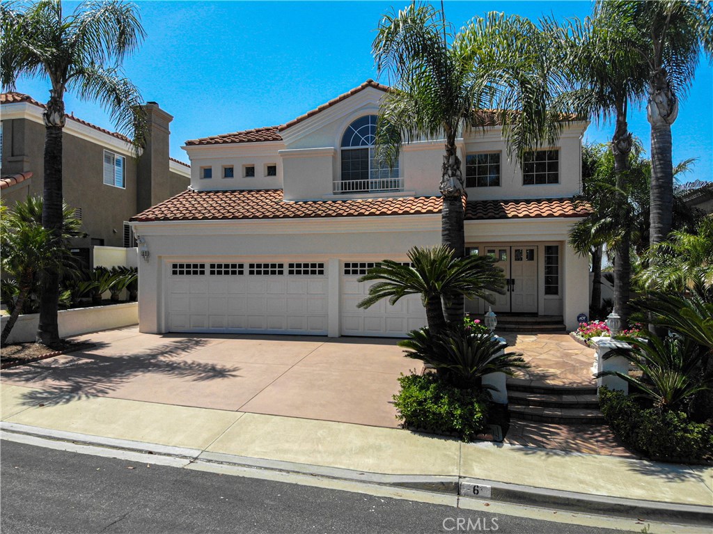 This stunning Mediterranean villa is nicely situated on a tranquil cul-de-sac street, tucked in the foothills with mountain & city light views. Every attention to detail is captivating upon entering this elegant home. The architectural details enhance the dramatic feel, which is complimented by polished marble and travertine flooring; gorgeous stone fireplace surround, kitchen counter tops, & backslash; custom kitchen cabinetry w/pull-out and soft-close doors. The wonderful California sunshine brightens the delightful back yard appointed with a custom saline pool & spa, cascading waterfall, & open entertaining spaces. A delightful skylight fills the circular staircase area, further accentuating this home’s wonderfully light & bright interior. The master retreat has views of city lights as well as offering a spacious room with adjoining master bath with separate tub & shower, walk-in closet & dual sinks. The two secondary bedrooms are privately situated for quiet enjoyment. The large bedroom/bonus room window frames the majestic Saddleback mountains view. Distinguished local schools provide excellent educational opportunities. Mountain bike in Whiting Ranch Wilderness Park; brisk walk down to the shopping centers for the everyday things; enjoy a wonderful compliment of restaurants & Regal Cinemas! Homes rarely come on the market in this lovely neighborhood, so race to this one! Check out the great video tours!