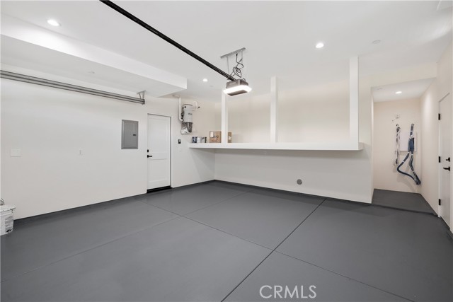 Built in Storage Shelves and Epoxy Flooring