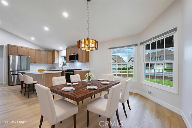Large dining space adjacent to the wide open kitchen