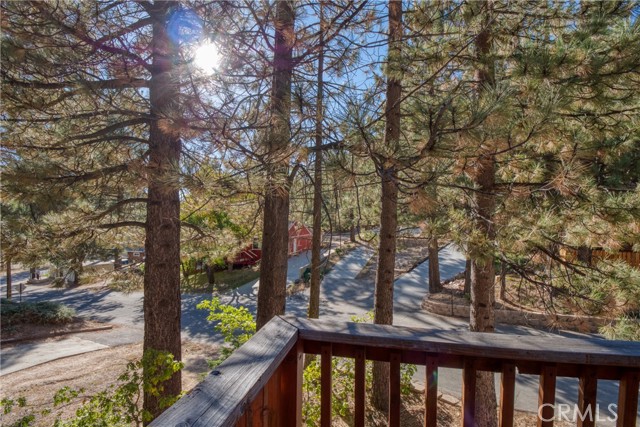 View from the front deck off of main house, showing where the road meets the lake