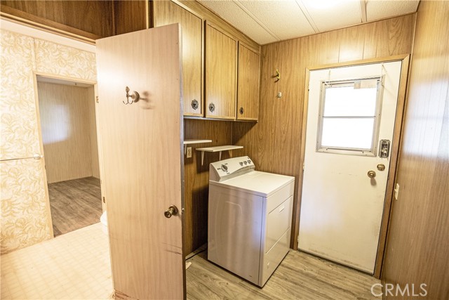 Laundry room with included dryer