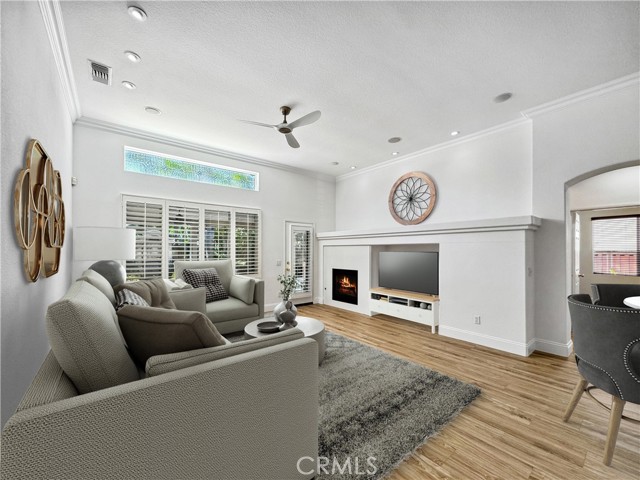 Great room/family room area. Photos depict virtual staging and are not representative of current furnishings in the home.