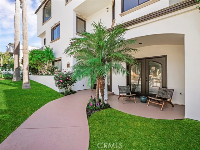 private walkway and grassy yard