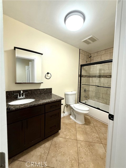 645 E 78th Street, Los Angeles CA: https://media.crmls.org/medias/31fc1226-ab2a-437c-a657-d946a4abc0c5.jpg