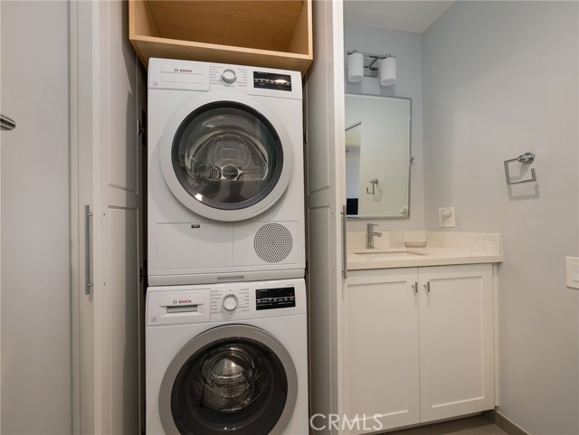 Good sized washer dryer in second elegant bathroom.