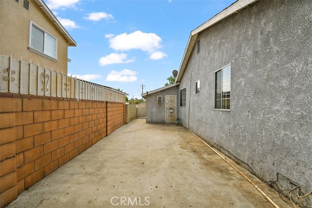 Side of Home looking into garage back door