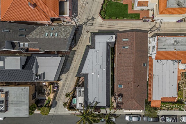 Bird's eye view showing roof and lot.