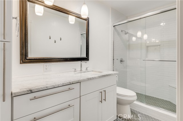 Bathroom with remodeled Shower and flooring