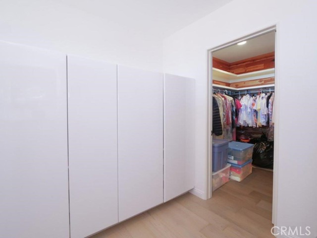 Wardrobe & Cedar-Lined Walk-in Closet in Primary Bedroom Suite