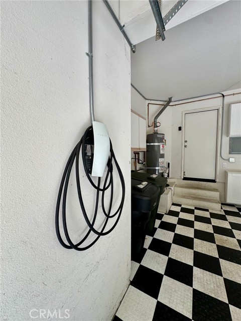 Tesla charger in garage included