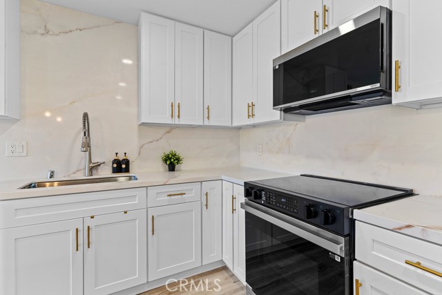 Detail Gallery Image 6 of 28 For 21921 Rimhurst Dr. #128-F,  Lake Forest,  CA 92630 - 2 Beds | 1 Baths