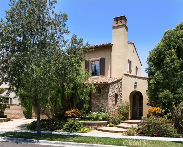 25 Momento Irvine, California Highly upgraded Quail Hill View Estate 4 bedroom home. Available Partially Furnished at $8500 or $7500 Unfurnished. Beautiful curb appeal with this Tuscan stone finish. Lovely downstairs full guest bedroom with full bath. Beautiful stone floors throughout downstairs. Formal living or sitting room as you enter, and separate formal dining room with beautiful chandelier open to outdoor private patio with seating and plants to enjoy. Amazing open chefs kitchen with breakfast nook seating. High end stainless steel appliances, range, and beautiful island. Kitchen open to extra large family room. with built-in entertainment center and grand fireplace for relaxing at home. Almost 6700 SF lot! Upscale hardscape and professionally designed backyard with spacious seating to enjoy amazing views of city lights, Disneyland fireworks, Irvine Spectrum. Upstairs living area boasts 3 generous size additional bedrooms with 2 full bathrooms. Master bedroom has separate retreat and beautiful balcony with views for miles. Master bath highly upgraded with spa-like stone shower, upscale oversized bath with separate his & her sinks & counters. Additional private gym or yoga room off the master bath overlooking city lights! Best work out view! Home located at the top of tree lined Quail Hill community. 3 community pools, 5 parks, rolling hills and upscale fitness center in #1 University High School district! Lovely central location in the heart of OC- close to shopping, 7 miles to Laguna Beach.
